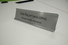 Name Tags, Desk Plates & Uniforms for Sign Solutions